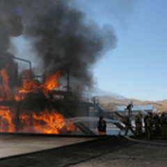 Firefighters Trying to Put Out a Fire